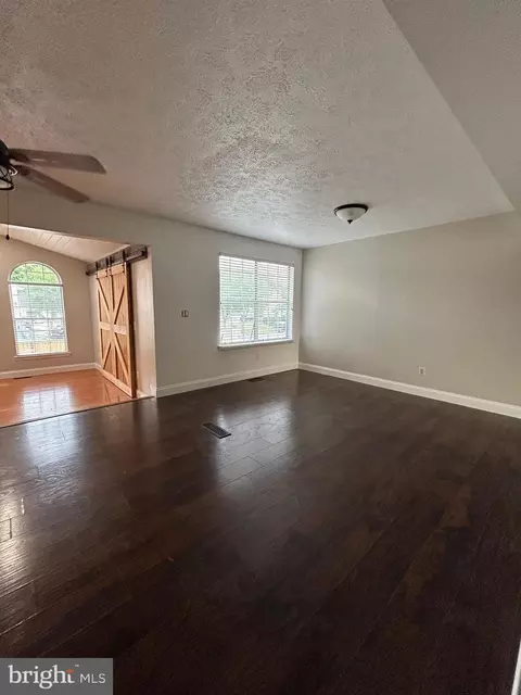 Living - 7805 Mallow Ct, Pasadena, MD 21122 photo 3 of 5