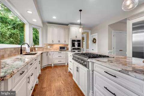 Kitchen - 8345 Forest Glen Dr, Pasadena, MD 21122 photo 6 of 9