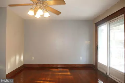 Living - 7690 Oak Ln, Pasadena, MD 21122 photo 3 of 3