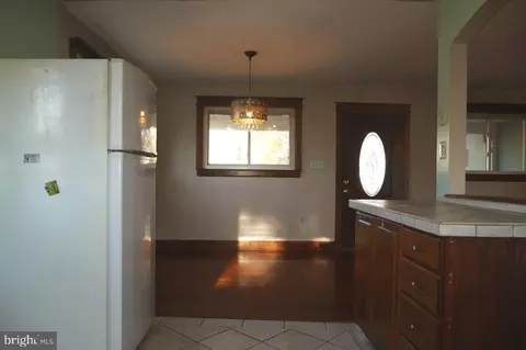 Entry Way - 7690 Oak Ln, Pasadena, MD 21122 photo 1 of 5