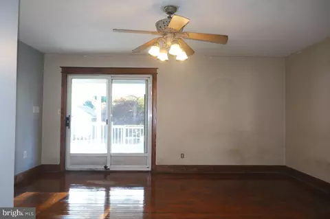 Living - 7690 Oak Ln, Pasadena, MD 21122 photo 2 of 3