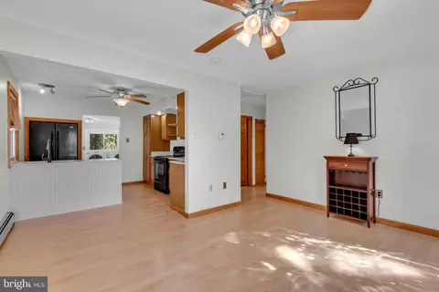 Living - 4 Spring Knoll Dr, Pasadena, MD 21122 photo 4 of 5