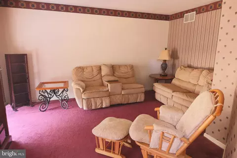 Living - 303 Maro Rd, Pasadena, MD 21122 photo 1 of 2