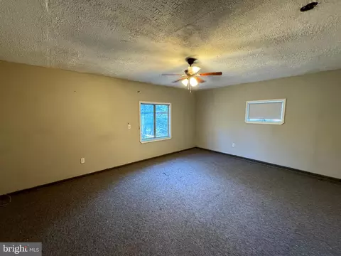 Living - 8267 Old Mill Rd, Pasadena, MD 21122 photo 3 of 7