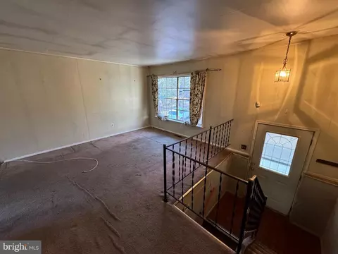 Living - 8267 Old Mill Rd, Pasadena, MD 21122 photo 2 of 7