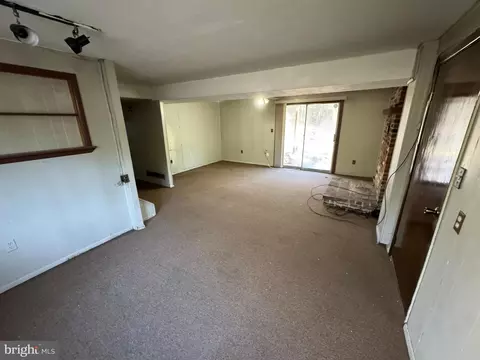 Living - 8267 Old Mill Rd, Pasadena, MD 21122 photo 5 of 7