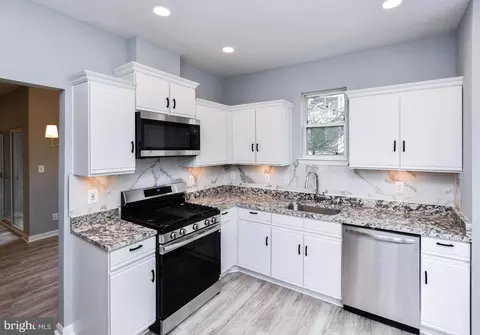 Kitchen - 3517 Piney Woods Pl #E204, Laurel, MD 20724 photo 1 of 2