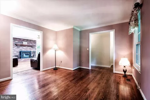 Living - 9180 Rolling Meadow Run, Pasadena, MD 21122 photo 3 of 8