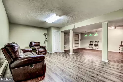 Living - 9180 Rolling Meadow Run, Pasadena, MD 21122 photo 6 of 8