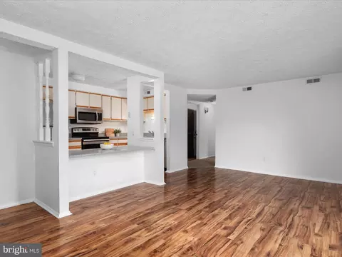Living - 8036 D Abbey Ct #D, Pasadena, MD 21122 photo 2 of 3
