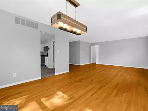 Living - 220 Falcon Dr, Pasadena, MD 21122 photo 4 of 11