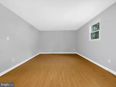 Living - 220 Falcon Dr, Pasadena, MD 21122 photo 10 of 11