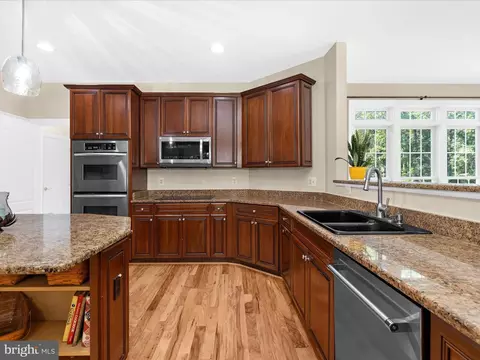 Kitchen - 1628 Carnoustie Dr, Pasadena, MD 21122 photo 4 of 7
