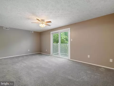 Living - 8048 M Abbey Ct #M, Pasadena, MD 21122 photo 3 of 4