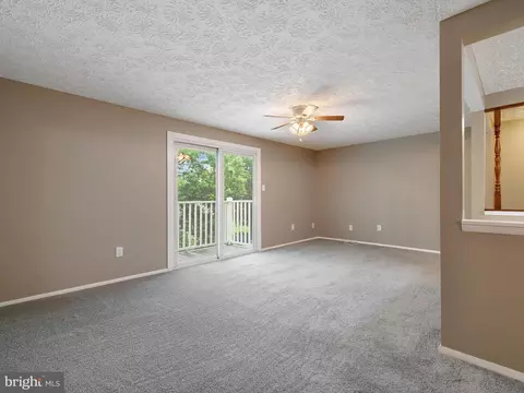 Living - 8048 M Abbey Ct #M, Pasadena, MD 21122 photo 2 of 4
