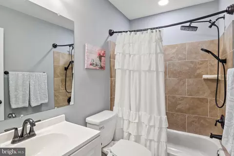 Bath - 7693 Oak Ln, Pasadena, MD 21122 photo 1 of 2