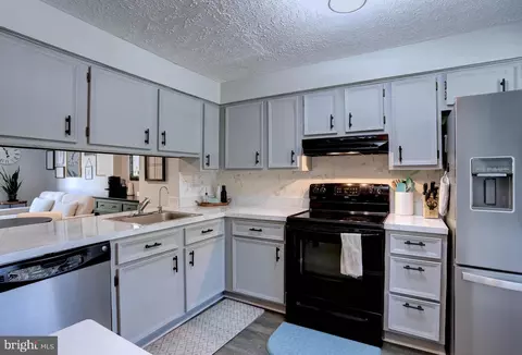 Kitchen - 8131 Tower Bridge Dr, Pasadena, MD 21122 photo 1 of 2