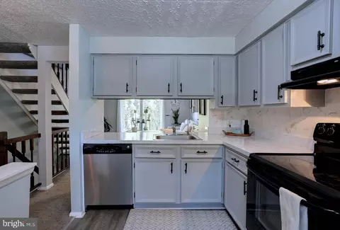 Kitchen - 8131 Tower Bridge Dr, Pasadena, MD 21122 photo 2 of 2