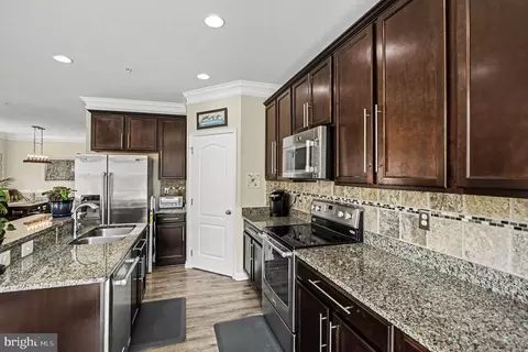 Kitchen - 7915 Charles Ct, Pasadena, MD 21122 photo 2 of 2