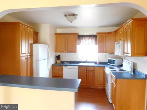 Kitchen - 8384 Forest Dr, Pasadena, MD 21122 photo 2 of 2
