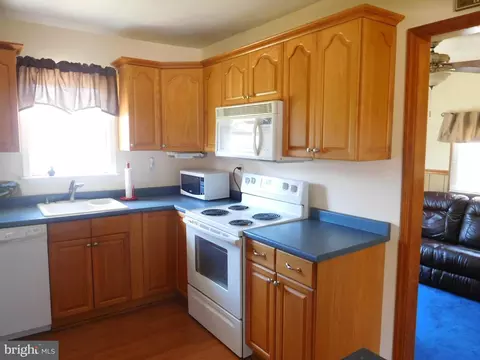 Kitchen - 8384 Forest Dr, Pasadena, MD 21122 photo 1 of 2