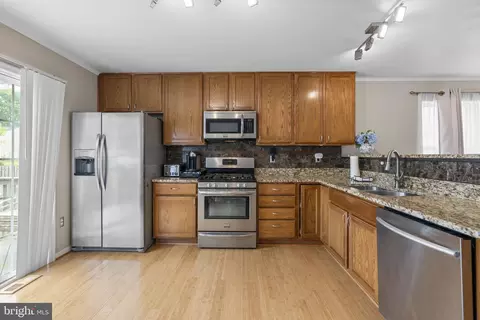 Kitchen - 8057 Mayer Ave, Pasadena, MD 21122 photo 2 of 3