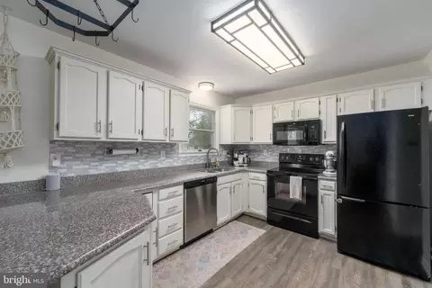 Kitchen - 7763 Old House Rd, Pasadena, MD 21122 photo 2 of 3