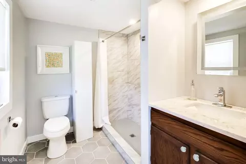 Bath - 8014 Forest Glen Dr, Pasadena, MD 21122 photo 1 of 2