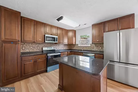 Kitchen - 313 Cool Breeze Ct, Pasadena, MD 21122 photo 2 of 2