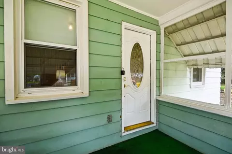 Exterior - 7807 Harbor Dr, Orchard Beach, MD 21226 photo 2 of 3