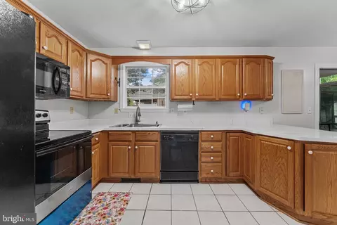 Kitchen - 7774 Old House Rd, Pasadena, MD 21122 photo 4 of 4