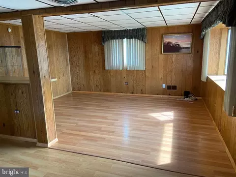Living - 7678 Berry Dr, Pasadena, MD 21122 photo 3 of 3