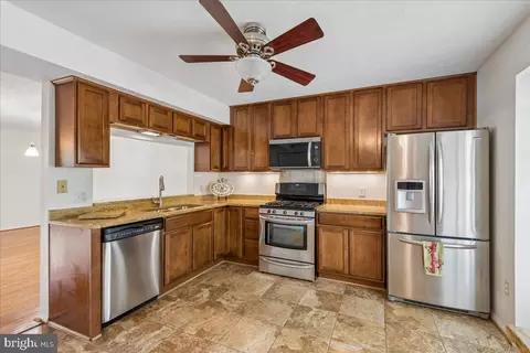 Kitchen - 7907 Leeds Dr, Pasadena, MD 21122 photo 1 of 2