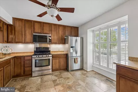 Kitchen - 7907 Leeds Dr, Pasadena, MD 21122 photo 2 of 2