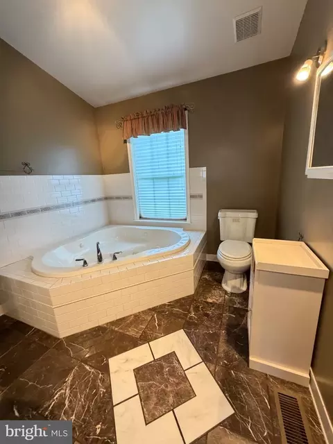 Bath - 8390 Oak Dr, Pasadena, MD 21122 photo 2 of 4