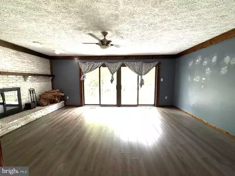Living - 7635 Stoney Creek Dr, Pasadena, MD 21122 photo 8 of 10