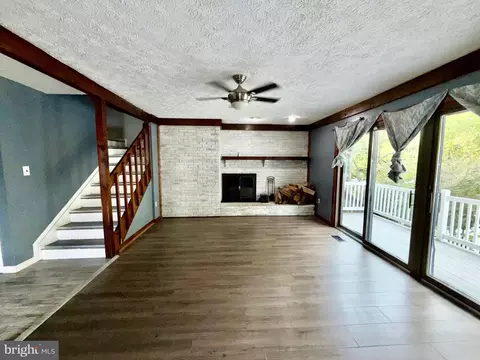 Living - 7635 Stoney Creek Dr, Pasadena, MD 21122 photo 4 of 10