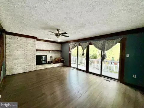 Living - 7635 Stoney Creek Dr, Pasadena, MD 21122 photo 1 of 10