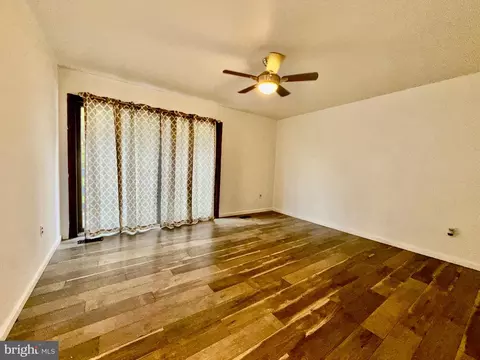 Living - 7635 Stoney Creek Dr, Pasadena, MD 21122 photo 3 of 10
