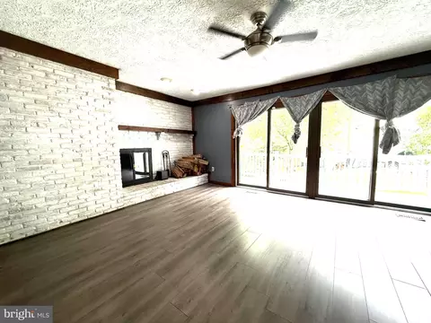 Living - 7635 Stoney Creek Dr, Pasadena, MD 21122 photo 10 of 10