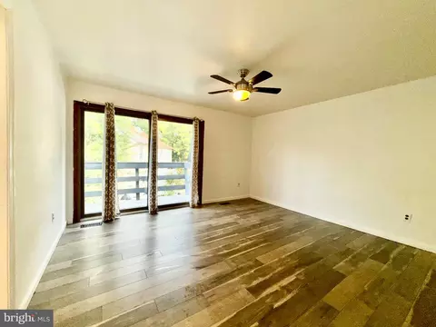 Living - 7635 Stoney Creek Dr, Pasadena, MD 21122 photo 6 of 10