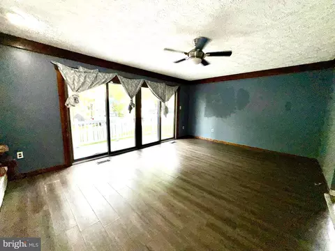 Living - 7635 Stoney Creek Dr, Pasadena, MD 21122 photo 5 of 10