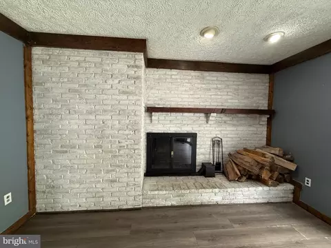 Living - 7635 Stoney Creek Dr, Pasadena, MD 21122 photo 7 of 10