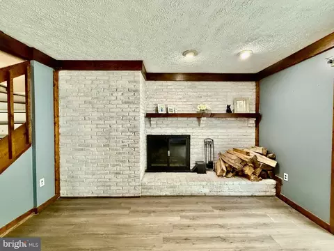 Living - 7635 Stoney Creek Dr, Pasadena, MD 21122 photo 2 of 10