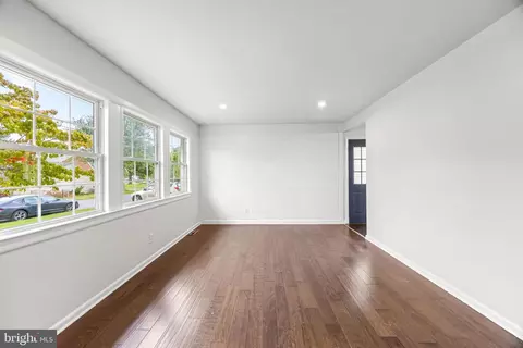 Living - 8483 Arbutus Rd, Pasadena, MD 21122 photo 1 of 2