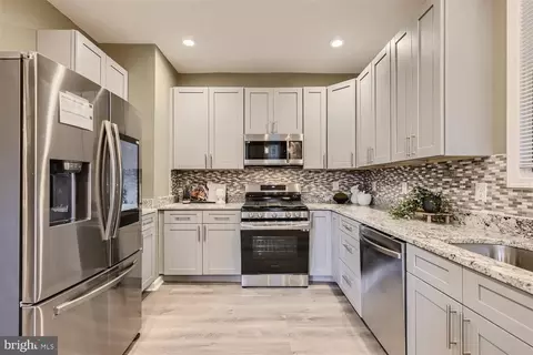 Kitchen - 915 Cator Ave, Baltimore, MD 21218 photo 2 of 4