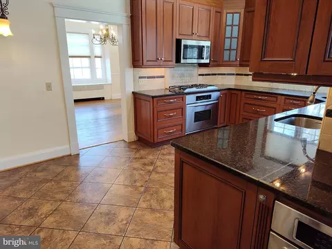 Kitchen - 3707 W Strathmore Ave, Baltimore, MD 21215 photo 10 of 12