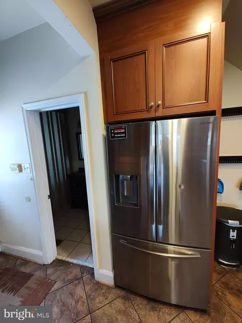 Kitchen - 3707 W Strathmore Ave, Baltimore, MD 21215 photo 11 of 12