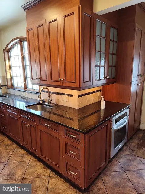 Kitchen - 3707 W Strathmore Ave, Baltimore, MD 21215 photo 8 of 12