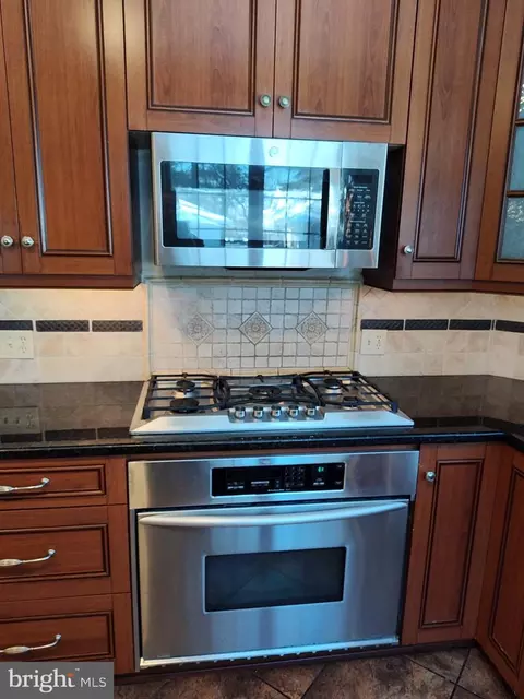 Kitchen - 3707 W Strathmore Ave, Baltimore, MD 21215 photo 1 of 12